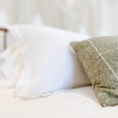 Super soft pillows provide a cloud-like and comforting feel, cradling the head and neck with their gentle plushness, creating a cozy and relaxing atmosphere perfect for a restful sleep
