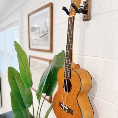 The ukulele is an iconic symbol of Hawaiian culture, representing the islands' rich history and traditions through its distinctive sound and the artful craftsmanship of its design